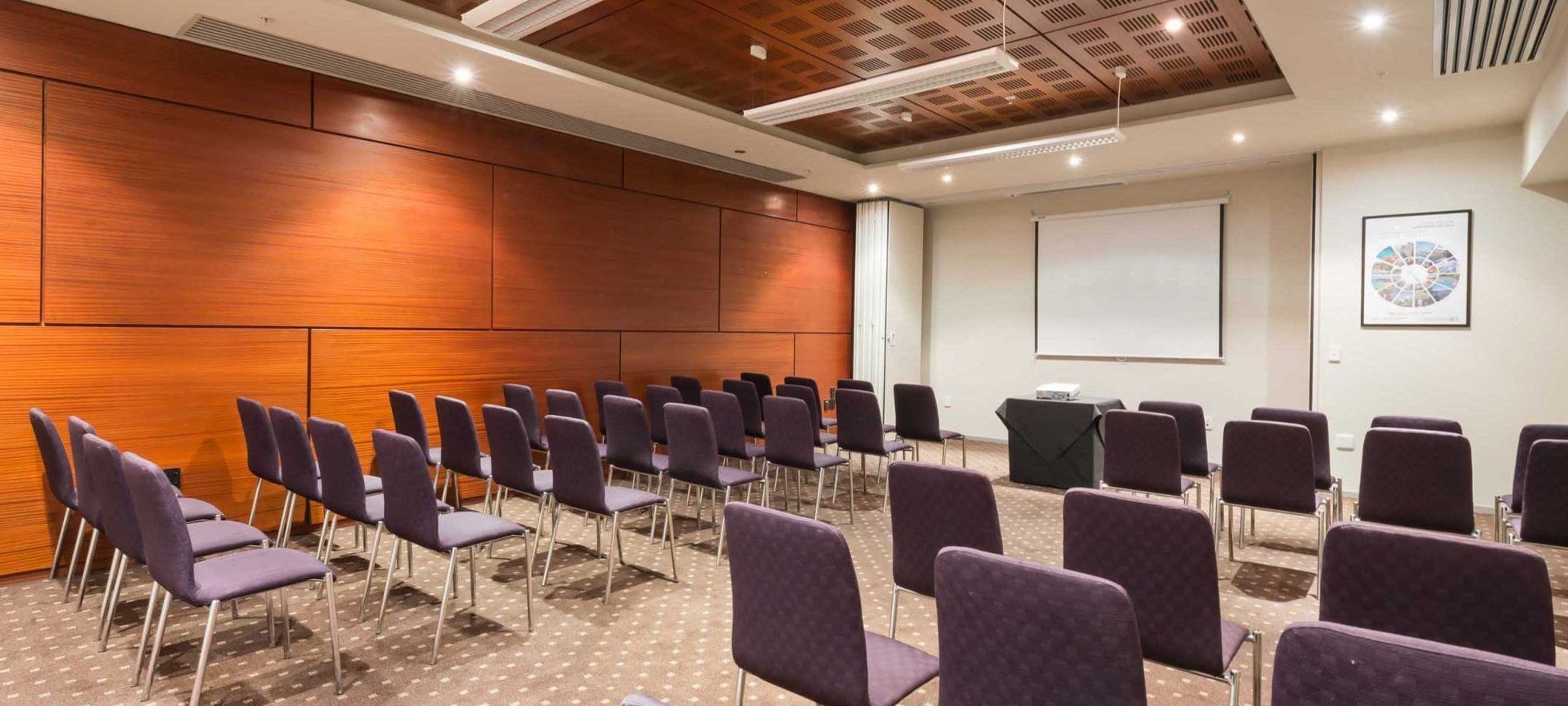 Schist conference room set for a private business dinner at Joynexa hotel